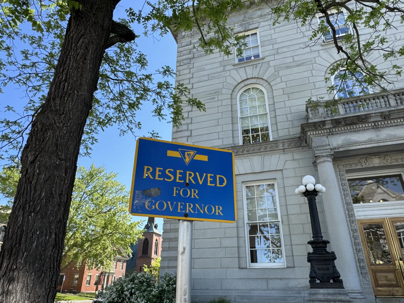 An image of the governor's parking placard at the NH State House.