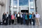 Plaintiffs stand in front of the US District Courthouse