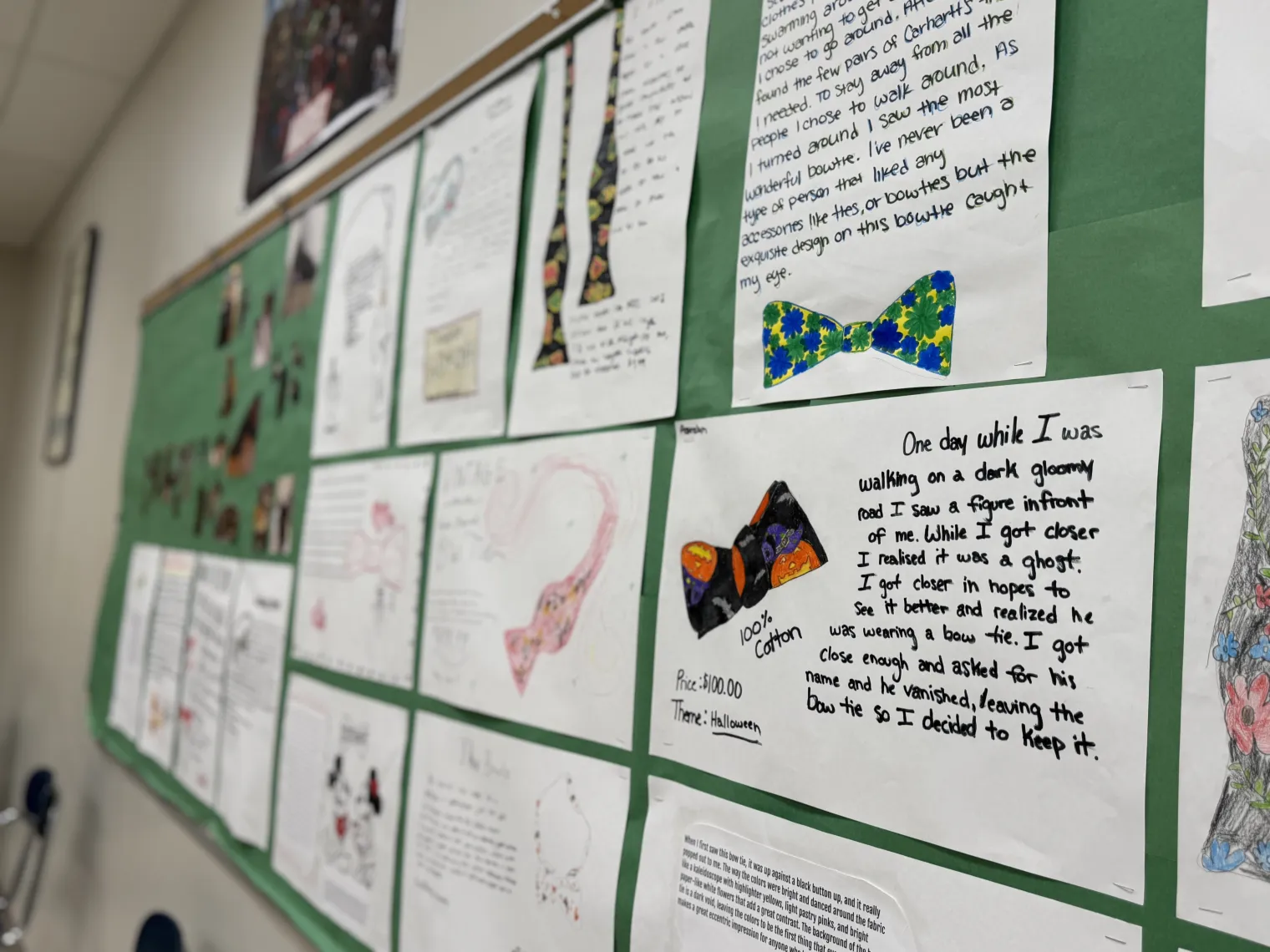 A bulletin board in Skip Chalker's classroom displays a selection of the magazine ads inspired by his handmade bow ties.