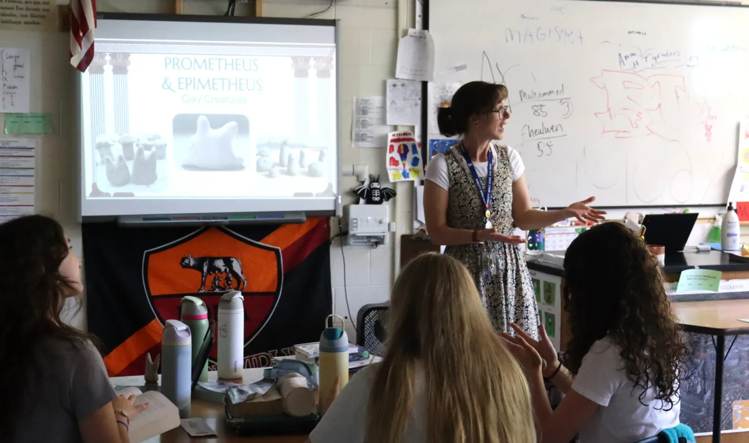 2027 NH TOTY Finalist Katie McDonough stands in front of her classroom delivering a lesson on Prometheus