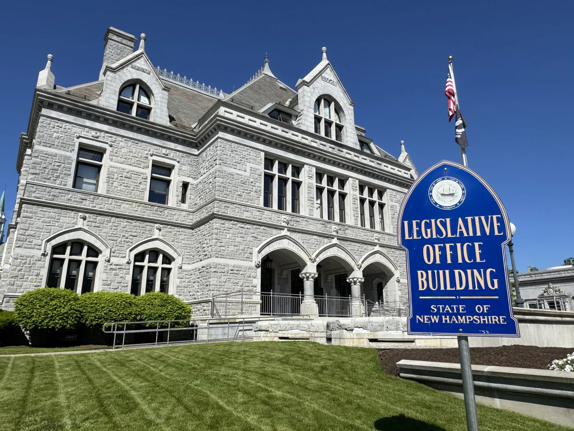 An image of the NH Legislative Office Building in spring.