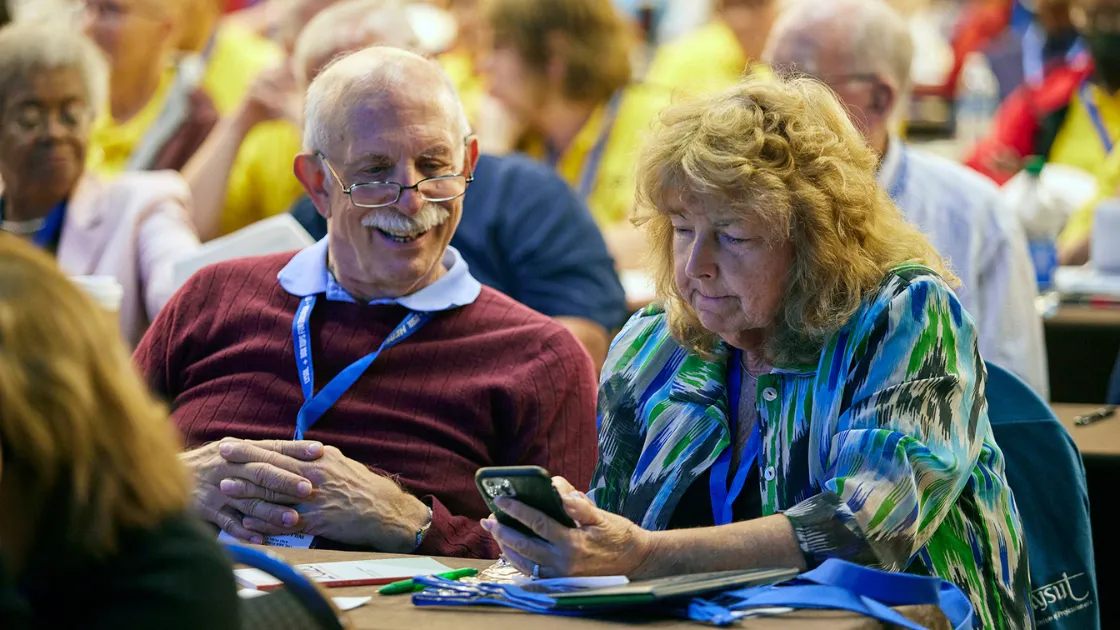 Retired members at a conference together