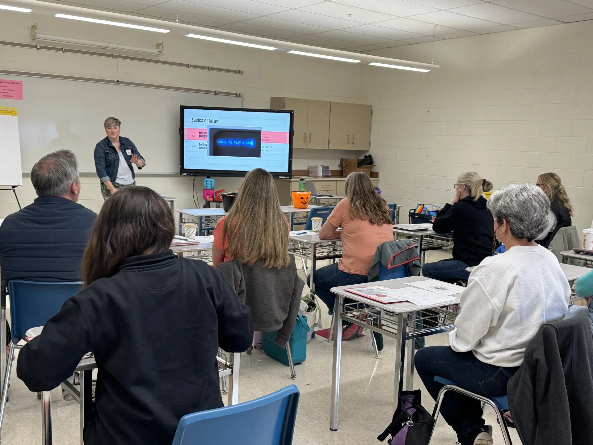Fall Instructional Conference attendees in a classroom professional development session.