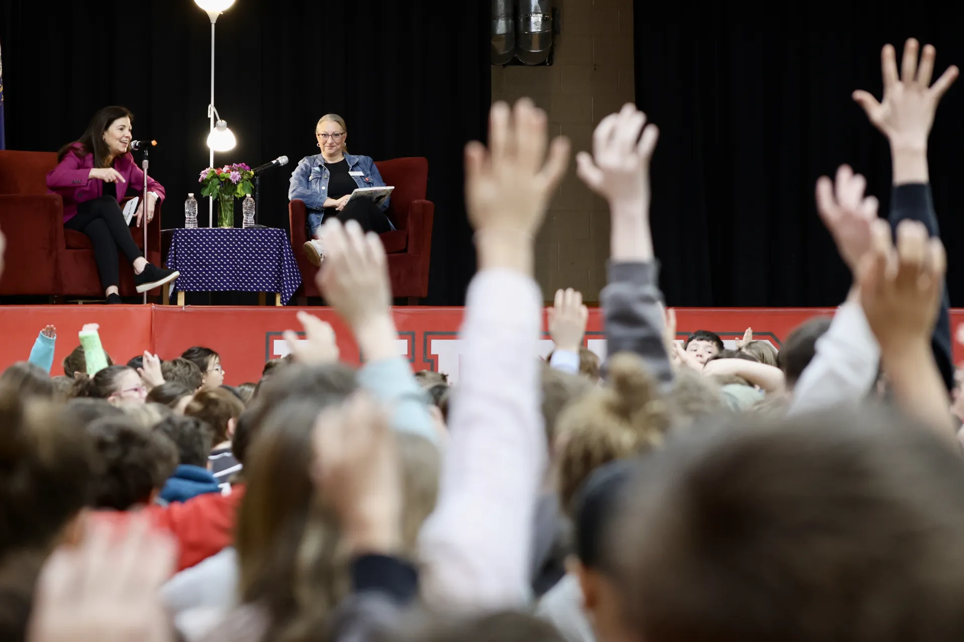 Governor Kelly Ayotte and NEA-NH President Megan Tuttle take questions from students at Auburn Village School during a Read Across America event.